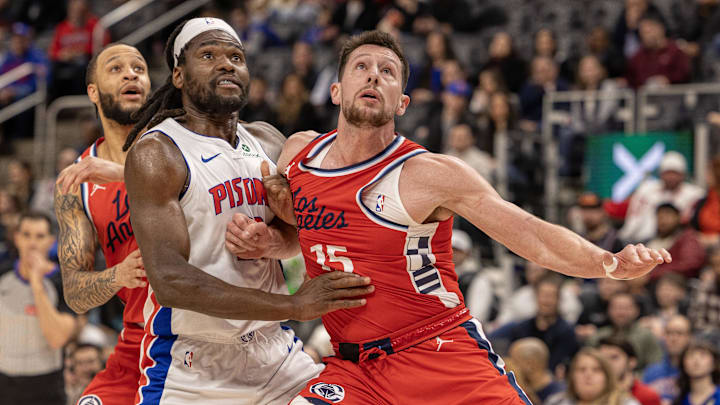 Feb 24, 2025; Detroit, Michigan, USA; Detroit Pistons center Isaiah Stewart (28) battles for position with LA Clippers forward Drew Eubanks (15) during the first half at Little Caesars Arena. Mandatory Credit: David Reginek-Imagn Images