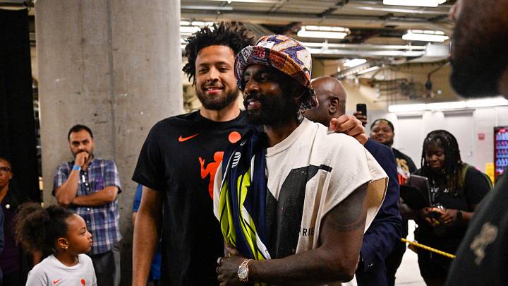 Jun 27, 2025; Dallas, Texas, USA; Dallas Mavericks point guard Kyrie Irving (right) poses for a photo with Detroit Pistons point guard Cade Cunningham (left) after the game between the Dallas Wings and the Indiana Fever at the American Airlines Center. Mandatory Credit: Jerome Miron-Imagn Images Jun 27, 2025; Dallas, Texas, USA; Dallas Mavericks point guard Kyrie Irving (right) poses for a photo with Detroit Pistons point guard Cade Cunningham (left) after the game between the Dallas Wings and the Indiana Fever at the American Airlines Center. Mandatory Credit: Jerome Miron-Imagn Images