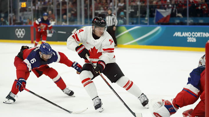 Feb 12, 2026; Milan, Italy; Bo Horvat of Canada scores their third goal against Czechia in a men's ice hockey group A match during the Milano Cortina 2026 Olympic Winter Games at Milano Santagiulia Ice Hockey Arena. Mandatory Credit: Geoff Burke-Imagn Images Feb 12, 2026; Milan, Italy; Bo Horvat of Canada scores their third goal against Czechia in a men's ice hockey group A match during the Milano Cortina 2026 Olympic Winter Games at Milano Santagiulia Ice Hockey Arena. Mandatory Credit: Geoff Burke-Imagn Images