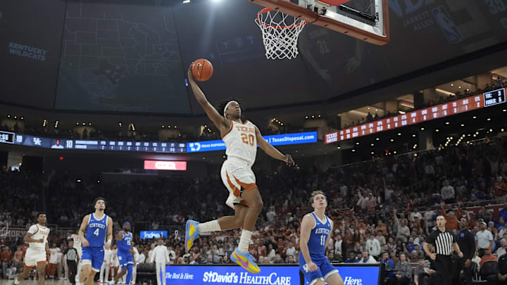 Feb 15, 2025; Austin, Texas, USA; Texas Longhorns guard Tre Johnson (20) goes up to dunk during the first half against the Kentucky Wildcats at Moody Center.