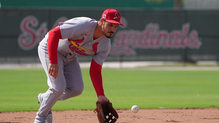 Feb 17, 2025; Jupiter, FL, USA;  St. Louis Cardinals third base Nolan Arenado (28) takes infield practice at spring training. Mandatory Credit: Jim Rassol-Imagn Images