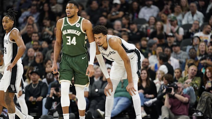 Jan 31, 2025; San Antonio, Texas, USA; Milwaukee Bucks forward Giannis Antetokounmpo (34) and San Antonio Spurs center Victor Wembanyama (1) during the first half at Frost Bank Center. Mandatory Credit: Scott Wachter-Imagn Images