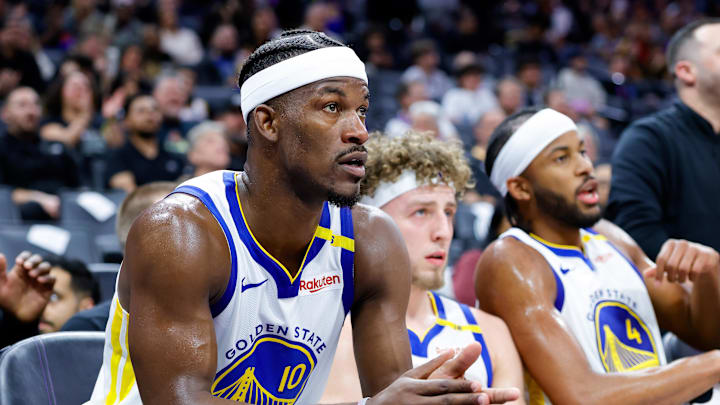 Feb 21, 2025; Sacramento, California, USA; Golden State Warriors forward Jimmy Butler III (10) claps from the bench during the fourth quarter against the Sacramento Kings at Golden 1 Center. Mandatory Credit: Sergio Estrada-Imagn Images