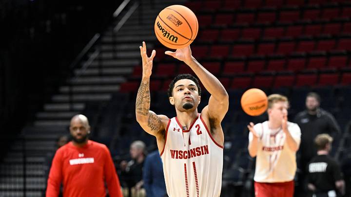 Mar 18, 2026; Portland, OR, USA; Wisconsin Badgers guard Nick Boyd (2) shoots the ball during a practice session ahead of the first round of the men's 2026 NCAA Tournament at Moda Center. Mandatory Credit: Craig Strobeck-Imagn Images