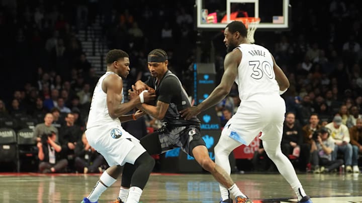 Apr 3, 2025; Brooklyn, New York, USA; Minnesota Timberwolves shooting guard Anthony Edwards (5) and Brooklyn Nets guard Keon Johnson (45) battle for the ball during the first half at Barclays Center. Mandatory Credit: Gregory Fisher-Imagn Images Apr 3, 2025; Brooklyn, New York, USA; Minnesota Timberwolves shooting guard Anthony Edwards (5) and Brooklyn Nets guard Keon Johnson (45) battle for the ball during the first half at Barclays Center. Mandatory Credit: Gregory Fisher-Imagn Images