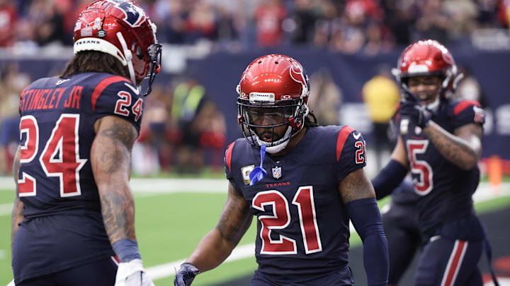 Nov 19, 2023; Houston, Texas, USA; Houston Texans cornerback Derek Stingley Jr. (24) celebrates cornerback Steven Nelson (21) defensive play against the Arizona Cardinals  in the second half at NRG Stadium. Mandatory Credit: Thomas Shea-Imagn Images