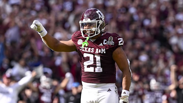 Dec 20, 2025; College Station, TX, USA; Texas A&M Aggies linebacker Taurean York (21) celebrates during the game between the Aggies and the Hurricanes at Kyle Field. Mandatory Credit: Jerome Miron-Imagn Images Dec 20, 2025; College Station, TX, USA; Texas A&M Aggies linebacker Taurean York (21) celebrates during the game between the Aggies and the Hurricanes at Kyle Field. Mandatory Credit: Jerome Miron-Imagn Images