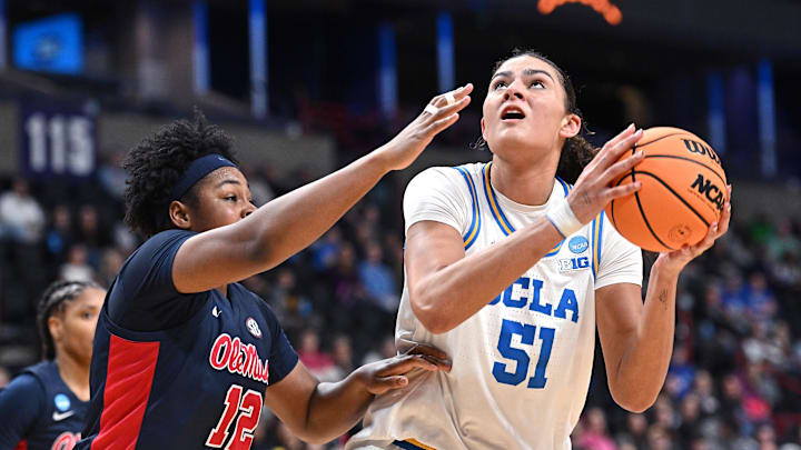 Mar 28, 2025; Spokane, WA, USA; UCLA Bruins center Lauren Betts (51) shoots against Ole Miss Rebels forward Christeen Iwuala (12) during the second half of a Sweet 16 NCAA Tournament basketball game at Spokane Arena. at Spokane Arena. Mandatory Credit: James Snook-Imagn Images Mar 28, 2025; Spokane, WA, USA; UCLA Bruins center Lauren Betts (51) shoots against Ole Miss Rebels forward Christeen Iwuala (12) during the second half of a Sweet 16 NCAA Tournament basketball game at Spokane Arena. at Spokane Arena. Mandatory Credit: James Snook-Imagn Images