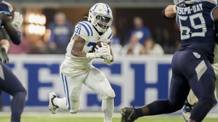 Dec 22, 2024; Indianapolis, Indiana, USA; Indianapolis Colts running back Tyler Goodson (31) rushes the ball during a game against the Tennessee Titans at Lucas Oil Stadium. Mandatory Credit: Grace Hollars/USA Today Network via Imagn Images Dec 22, 2024; Indianapolis, Indiana, USA; Indianapolis Colts running back Tyler Goodson (31) rushes the ball during a game against the Tennessee Titans at Lucas Oil Stadium. Mandatory Credit: Grace Hollars/USA Today Network via Imagn Images