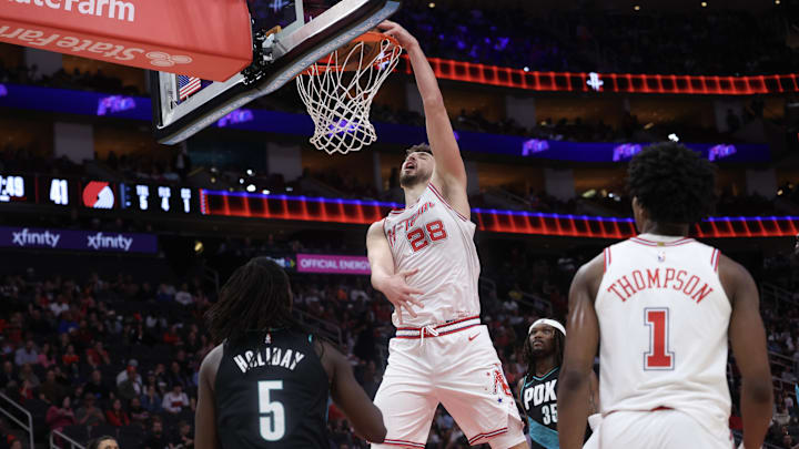 Mar 6, 2026; Houston, Texas, USA; Houston Rockets center Alperen Sengun (28) dunks against Portland Trail Blazers guard Jrue Holiday (5)  in the first half at Toyota Center. Mandatory Credit: Thomas Shea-Imagn Images