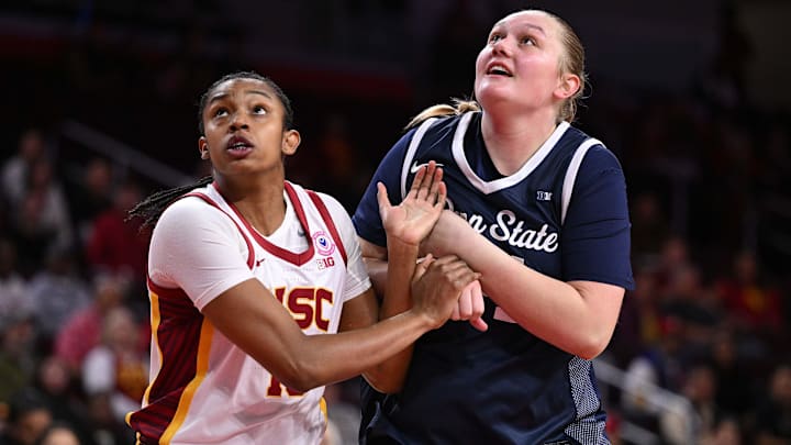 Jan 12, 2025; Los Angeles, California, USA; USC Trojans center Rayah Marshall (13) and Penn State Nittany Lions center Gracie Merkle (44) jockey for rebounding position during the first quarter at Galen Center. Mandatory Credit: Robert Hanashiro-Imagn Images