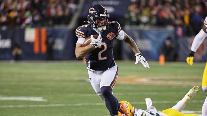 Dec 20, 2025; Chicago, Illinois, USA; Chicago Bears wide receiver DJ Moore (2) runs after the catch against Green Bay Packers guard Lecitus Smith (68) during the first quarter at Soldier Field Dec 20, 2025; Chicago, Illinois, USA; Chicago Bears wide receiver DJ Moore (2) runs after the catch against Green Bay Packers guard Lecitus Smith (68) during the first quarter at Soldier Field