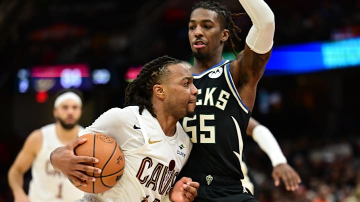 Dec 20, 2024; Cleveland, Ohio, USA; Cleveland Cavaliers guard Darius Garland (10) drives to the basket against Milwaukee Bucks guard Delon Wright (55) during the second half at Rocket Mortgage FieldHouse. Mandatory Credit: Ken Blaze-Imagn Images