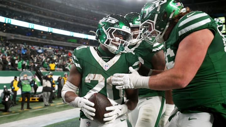 New York Jets running back Breece Hall (20) celebrates with his teammates after scoring a fourth quarter touchdown, Sunday January 5, 2025, in East Rutherford.