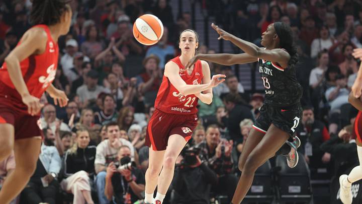 May 30, 2026; Portland, Oregon, USA; Indiana Fever guard Caitlin Clark (22) passes the ball down court against Portland Fire forward Nyadiew Puoch (13) during the first half at Moda Center. Mandatory Credit: Jaime Valdez-Imagn Images May 30, 2026; Portland, Oregon, USA; Indiana Fever guard Caitlin Clark (22) passes the ball down court against Portland Fire forward Nyadiew Puoch (13) during the first half at Moda Center. Mandatory Credit: Jaime Valdez-Imagn Images