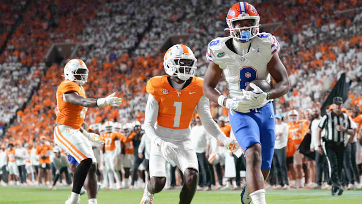 Oct 12, 2024; Knoxville, Tennessee, USA; Florida Gators tight end Arlis Boardingham (8) runs into the end zone for a touchdown against the Tennessee Volunteers at Neyland Stadium. Mandatory Credit: Angelina Alcantar/USA TODAY Network via Imagn Images