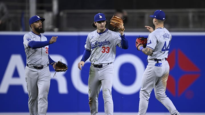 May 11, 2024; San Diego, California, USA; Los Angeles Dodgers left fielder Teoscar Hernandez (37) celebrates on the field with center fielder James Outman (33) and right fielder Andy Pages (44) after defeating the San Diego Padres at Petco Park. Mandatory Credit: Orlando Ramirez-Imagn Images May 11, 2024; San Diego, California, USA; Los Angeles Dodgers left fielder Teoscar Hernandez (37) celebrates on the field with center fielder James Outman (33) and right fielder Andy Pages (44) after defeating the San Diego Padres at Petco Park. Mandatory Credit: Orlando Ramirez-Imagn Images
