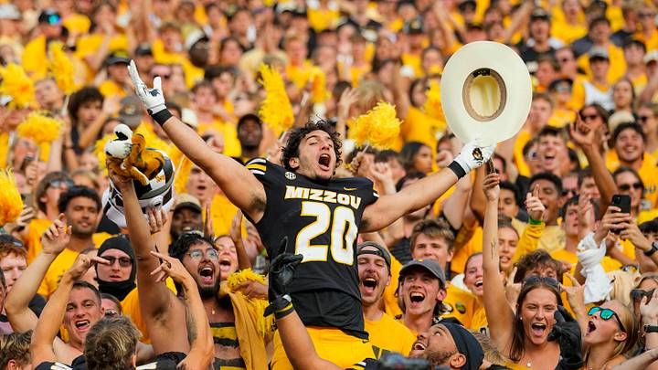 Sep 6, 2025; Columbia, Missouri, USA; Missouri Tigers linebacker Nicholas Rodriguez (20) celebrates with teammates after defeating the Kansas Jayhawks at Faurot Field at Memorial Stadium. Mandatory Credit: Jay Biggerstaff-Imagn Images Sep 6, 2025; Columbia, Missouri, USA; Missouri Tigers linebacker Nicholas Rodriguez (20) celebrates with teammates after defeating the Kansas Jayhawks at Faurot Field at Memorial Stadium. Mandatory Credit: Jay Biggerstaff-Imagn Images