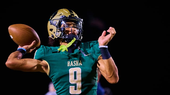 Basha Bears quarterback Demond Williams Jr. (9) warms up to face the Chandler Wolves at Basha High