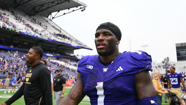 Sep 7, 2024; Seattle, Washington, USA; Washington Huskies running back Jonah Coleman (1) walks off the field after the game against the Eastern Michigan Eagles at Alaska Airlines Field at Husky Stadium. Mandatory Credit: Steven Bisig-Imagn Images