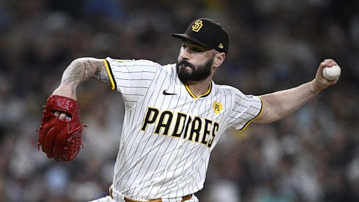 San Diego Padres relief pitcher Tanner Scott (66) pitches against the Minnesota Twins during the eighth inning at Petco Park in 2024.
