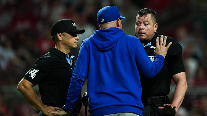 Mets manager Carlos Mendoza, middle, gets ejected by umpire Carlos Torres, right, during the game against the Reds. Mets manager Carlos Mendoza, middle, gets ejected by umpire Carlos Torres, right, during the game against the Reds.