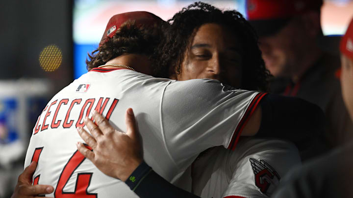 Sep 8, 2025; Cleveland, Ohio, USA; Cleveland Guardians starting pitcher Slade Cecconi (44) hugs catcher Bo Naylor (23) after losing his no-hitter on a hit by Kansas City Royals second baseman Michael Massey (not pictured) during the eighth inning at Progressive Field. Mandatory Credit: Ken Blaze-Imagn Images