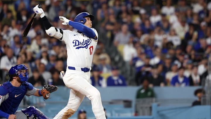 Los Angeles, California, USA; Los Angeles Dodgers designated hitter Shohei Ohtani (17) flys out against the Chicago Cubs during the seventh inning at Dodger Stadium. Los Angeles, California, USA; Los Angeles Dodgers designated hitter Shohei Ohtani (17) flys out against the Chicago Cubs during the seventh inning at Dodger Stadium.