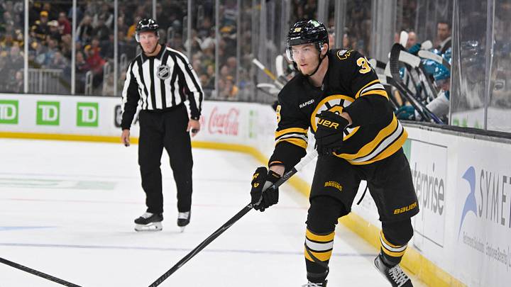 Oct 24, 2026; Boston, Massachusetts, USA; Boston Bruins center Morgan Geekie (39) passes the puck during the third period against the San Jose Sharks at TD Garden. Mandatory Credit: Eric Canha-Imagn Images