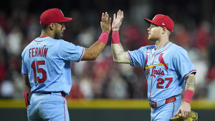 Aug 30, 2025; Cincinnati, Ohio, USA; St. Louis Cardinals second baseman Jose Fermin (15) high-fives outfielder Nathan Church (27) after the final out against the Cincinnati Reds in the ninth inning at Great American Ball Park. Mandatory Credit: Aaron Doster-Imagn Images Aug 30, 2025; Cincinnati, Ohio, USA; St. Louis Cardinals second baseman Jose Fermin (15) high-fives outfielder Nathan Church (27) after the final out against the Cincinnati Reds in the ninth inning at Great American Ball Park. Mandatory Credit: Aaron Doster-Imagn Images