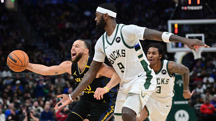 Feb 10, 2025; Milwaukee, Wisconsin, USA; Golden State Warriors guard Stephen Curry (30) gets pressure from Milwaukee Bucks forward Bobby Portis (9) in the second quarter at Fiserv Forum. Mandatory Credit: Benny Sieu-Imagn Images Feb 10, 2025; Milwaukee, Wisconsin, USA; Golden State Warriors guard Stephen Curry (30) gets pressure from Milwaukee Bucks forward Bobby Portis (9) in the second quarter at Fiserv Forum. Mandatory Credit: Benny Sieu-Imagn Images