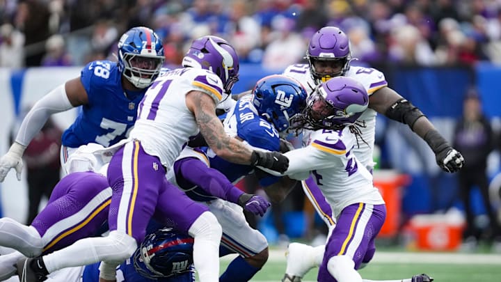 The Minnesota Vikings defense tackles New York Giants running back Tyrone Tracy Jr. (29) during a game at MetLife Stadium, Dec 21, 2025, East Rutherford, NJ, USA