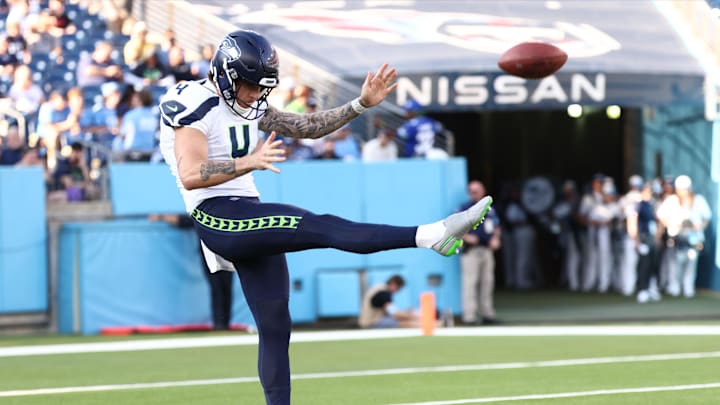 Michael Dickson punts during a Seahawks preseason game.