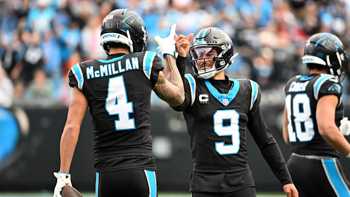 Dec 21, 2025; Charlotte, North Carolina, USA; Carolina Panthers quarterback Bryce Young (9) celebrates with wide receiver Tetairoa McMillan (4) after a play during the first half against the Tampa Bay Buccaneers at Bank of America Stadium. Mandatory Credit: Bob Donnan-Imagn Images Dec 21, 2025; Charlotte, North Carolina, USA; Carolina Panthers quarterback Bryce Young (9) celebrates with wide receiver Tetairoa McMillan (4) after a play during the first half against the Tampa Bay Buccaneers at Bank of America Stadium. Mandatory Credit: Bob Donnan-Imagn Images