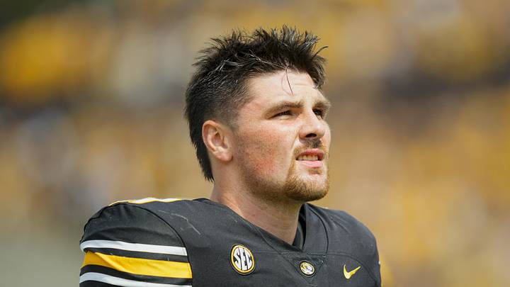 Sep 6, 2025; Columbia, Missouri, USA; Missouri Tigers defensive end Langden Kitchen (11) warms up prior to a game against the Kansas Jayhawks at Faurot Field at Memorial Stadium. Mandatory Credit: Jay Biggerstaff-Imagn Images Sep 6, 2025; Columbia, Missouri, USA; Missouri Tigers defensive end Langden Kitchen (11) warms up prior to a game against the Kansas Jayhawks at Faurot Field at Memorial Stadium. Mandatory Credit: Jay Biggerstaff-Imagn Images