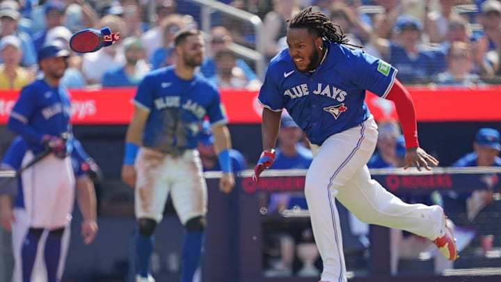 May 20, 2024; Toronto, Ontario, CAN; Toronto Blue Jays first base Vladimir Guerrero Jr. (27) runs for home plate scoring a run against the Chicago White Sox during the sixth inning at Rogers Centre. Mandatory Credit: Nick Turchiaro-USA TODAY Sports