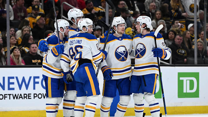Apr 23, 2026; Boston, Massachusetts, USA; Buffalo Sabres defenseman Bowen Byram (4) celebrates with his teammates after scoring a goal against the Boston Bruins during the second period of game three of the first round of the 2026 Stanley Cup Playoffs at the TD Garden. Mandatory Credit: Brian Fluharty-Imagn Images