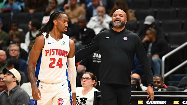 Mar 19, 2026; Washington, District of Columbia, USA; Detroit Pistons head coach J.B. Bickerstaff talks with guard Daniss Jenkins (24) against the Washington Wizards during the first half at Capital One Arena. Mandatory Credit: Brad Mills-Imagn Images
