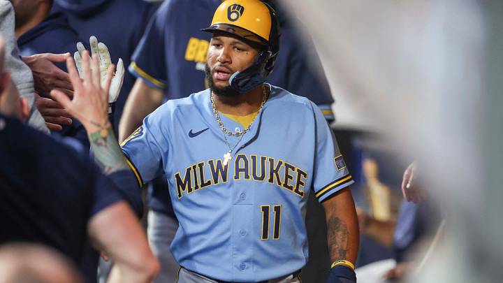 Aug 27, 2026; New York City, New York, USA;  Milwaukee Brewers left fielder Jackson Chourio (11) celebrates in the dugout with his teammates after scoring in the first inning against the New York Mets at Citi Field.  Mandatory Credit: Wendell Cruz-Imagn Images