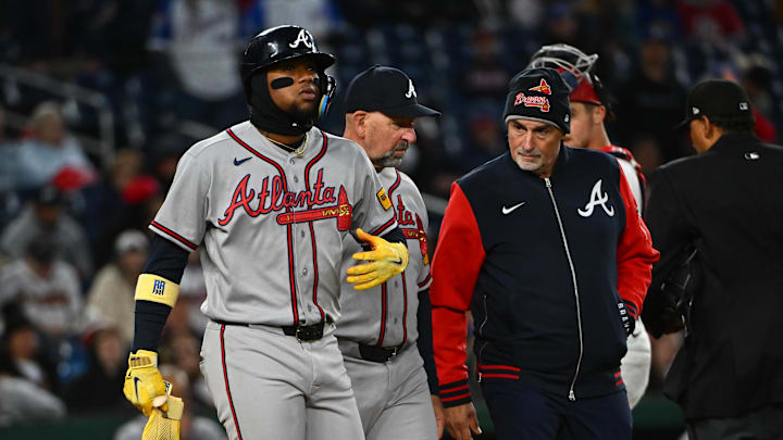 Apr 20, 2026; Washington, District of Columbia, USA; Atlanta Braves right fielder Ronald Acuña Jr. (13) reacts after being hit by a pitch against the Washington Nationals during the sixth inning at Nationals Park. Mandatory Credit: Brad Mills-Imagn Images