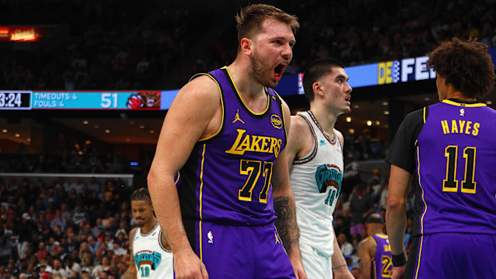 Mar 29, 2025; Memphis, Tennessee, USA; Los Angeles Lakers guard Luka Doncic (77) reacts during the second quarter against the Memphis Grizzlies at FedExForum. Mandatory Credit: Petre Thomas-Imagn Images
