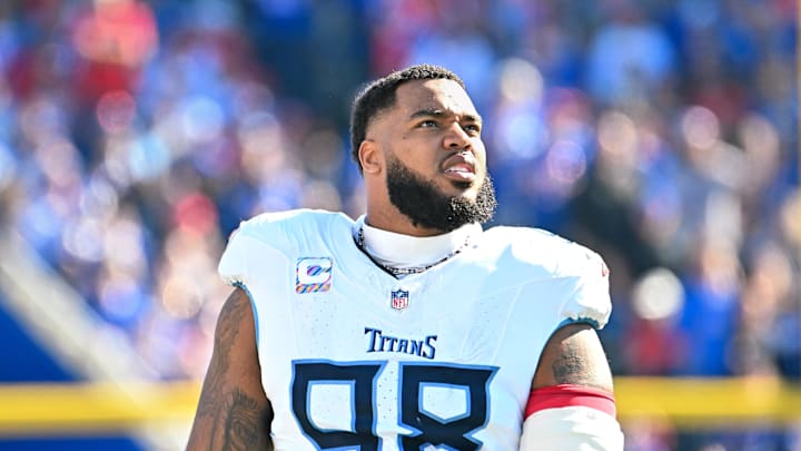 Oct 20, 2024; Orchard Park, New York, USA; Tennessee Titans defensive tackle Jeffery Simmons (98) looks to the scoreboard in the second quarter game against the Buffalo Bills at Highmark Stadium. Mandatory Credit: Mark Konezny-Imagn Images