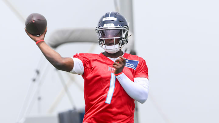 May 10, 2025; Nashville, TN, USA;  Tennessee Titans quarterback Cam Ward (1) throws a pass as he goes through throwing drills during Rookie Mini Camp at Saint Thomas Sports Park. Mandatory Credit: Steve Roberts-Imagn Images