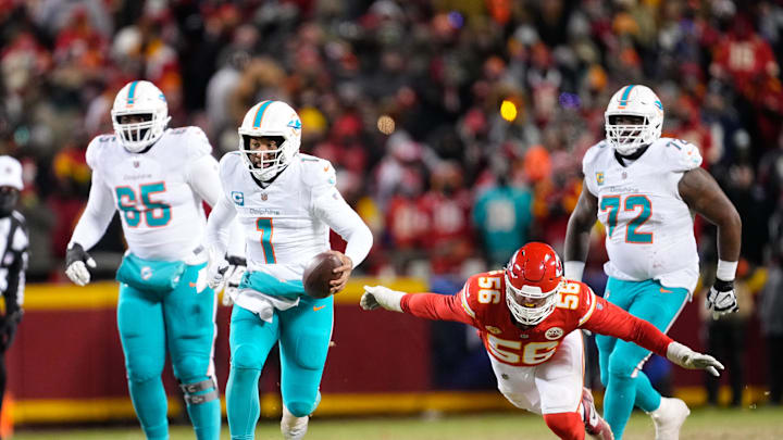 Jan 13, 2024; Kansas City, Missouri, USA; Miami Dolphins quarterback Tua Tagovailoa (1) runs the