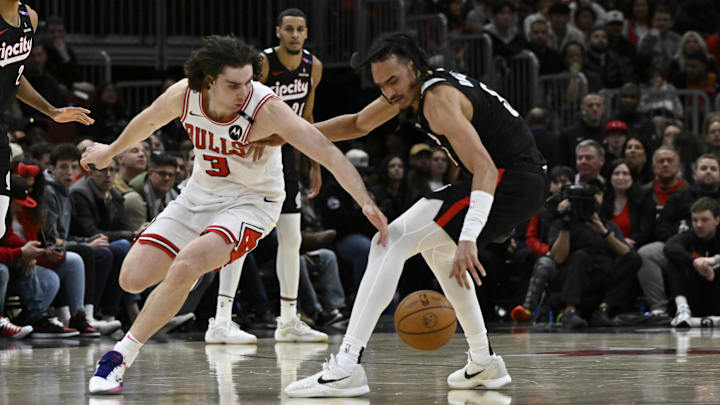 Apr 4, 2025; Chicago, Illinois, USA: Chicago Bulls guard Josh Giddey (3) and Portland Trail Blazers guard Dalano Banton (5) chase a loose ball during the second half at the United Center. Mandatory Credit: Matt Marton-Imagn Images