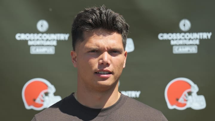 May 10, 2025; Berea, OH, USA; Cleveland Browns quarterback Dillon Gabriel (5) talks to the media during rookie minicamp at CrossCountry Mortgage Campus. Mandatory Credit: Ken Blaze-Imagn Images May 10, 2025; Berea, OH, USA; Cleveland Browns quarterback Dillon Gabriel (5) talks to the media during rookie minicamp at CrossCountry Mortgage Campus. Mandatory Credit: Ken Blaze-Imagn Images