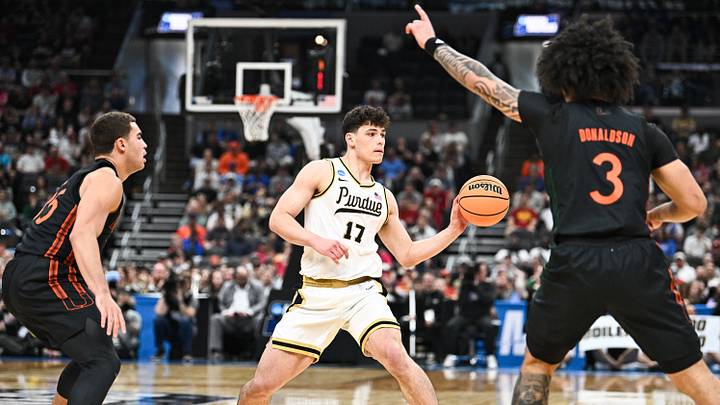 Mar 22, 2026; St. Louis, MO, USA; Purdue Boilermakers guard Omer Mayer (17) passes the ball during the first half against the Miami Hurricanes during a second round game of the men's 2026 NCAA Tournament at Enterprise Center. Mandatory Credit: Jeff Le-Imagn Images Mar 22, 2026; St. Louis, MO, USA; Purdue Boilermakers guard Omer Mayer (17) passes the ball during the first half against the Miami Hurricanes during a second round game of the men's 2026 NCAA Tournament at Enterprise Center. Mandatory Credit: Jeff Le-Imagn Images