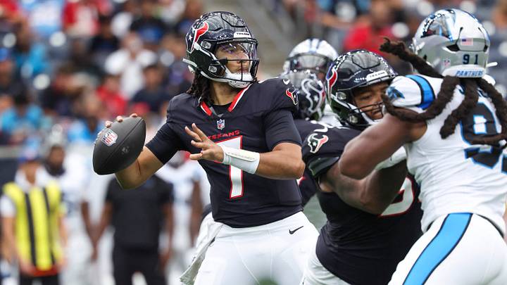 Aug 16, 2025; Houston, Texas, USA; Houston Texans quarterback C.J. Stroud (7) attempts a pass during the first quarter against the Carolina Panthers at NRG Stadium. Mandatory Credit: Troy Taormina-Imagn Images