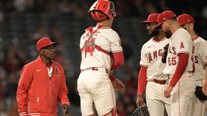 May 13, 2024; Anaheim, California, USA;   Los Angeles Angels manager Ron Washington (37) walks to the mound to pull relief pitcher Matt Moore (55) in the seventh inning against the St. Louis Cardinals at Angel Stadium. Mandatory Credit: Jayne Kamin-Oncea-Imagn Images
