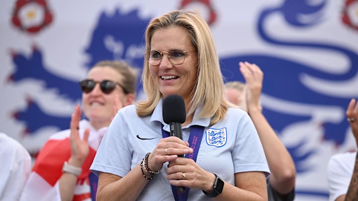 The Lionesses Lift The UEFA Women's Euro Trophy In Victory Celebration For Fans
